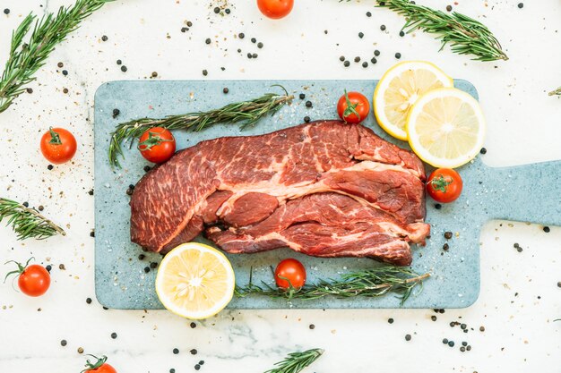 Raw beef meat on cutting board