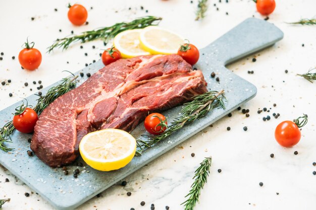 Raw beef meat on cutting board