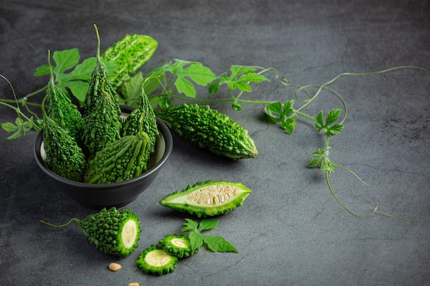 Free photo raw bitter gourds put in black bowl