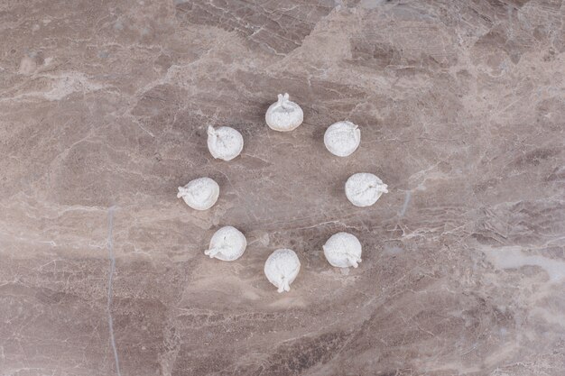 Free photo raw dumplings on marble.