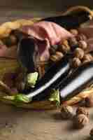 Free photo raw eggplants ready to be cooked