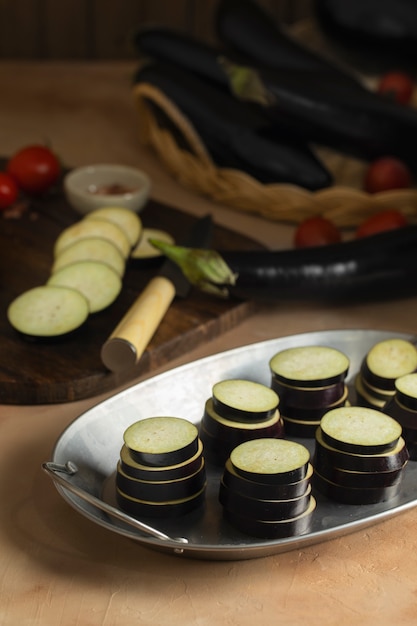 Free photo raw eggplants ready to be cooked