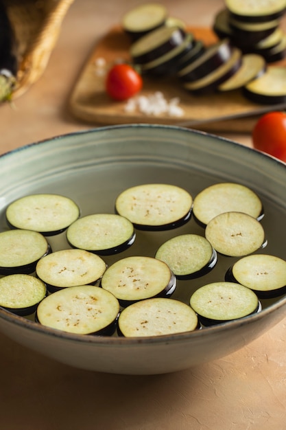 Free photo raw eggplants ready to be cooked