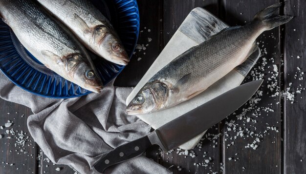 Raw fish arrangement for cooking