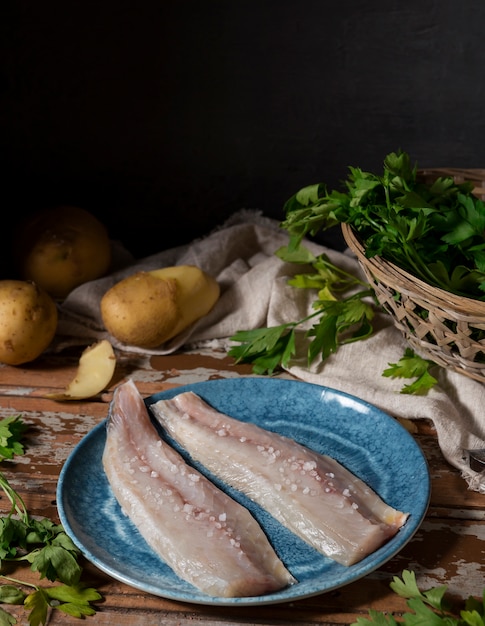 Raw fish composition for cooking