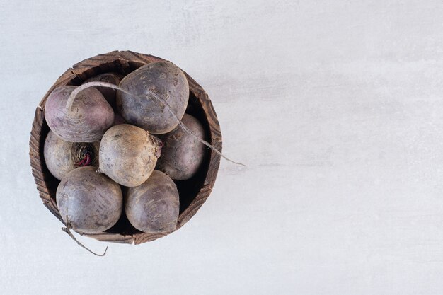 Raw fresh beetroots in wooden bucket. High quality photo