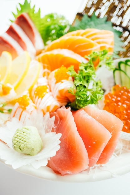 Raw and fresh mixed sashimi with salmon , tuna , hamaji and other
