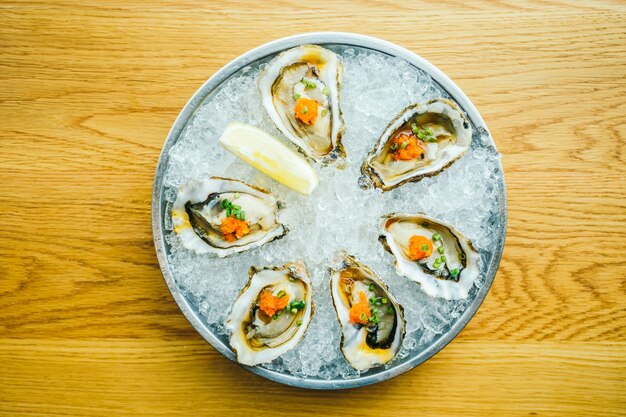 Raw and fresh oyster shell with lemon