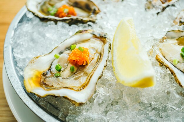 Raw and fresh oyster shell with lemon