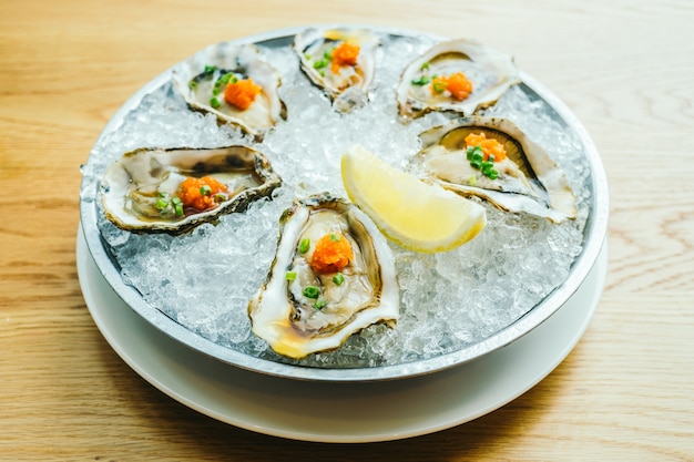 Raw and fresh oyster shell with lemon