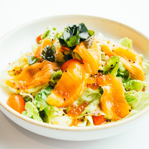 Raw fresh salmon meat sashimi with vegetable salad