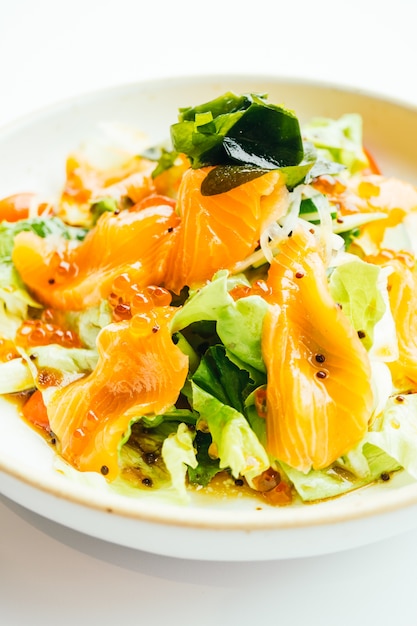 Raw fresh salmon meat sashimi with vegetable salad