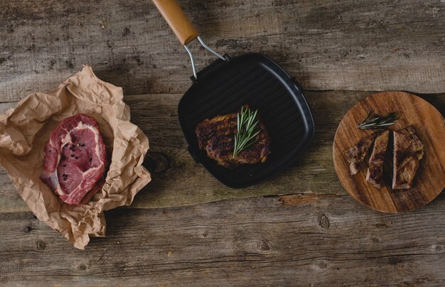 Raw and grilled steak