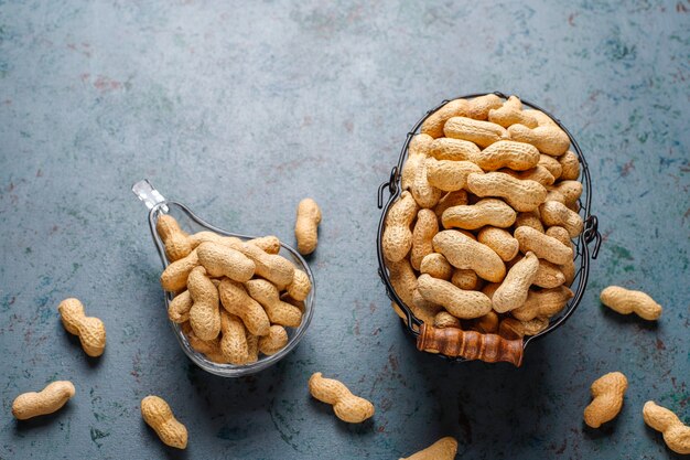 Raw organic peanuts in shell.