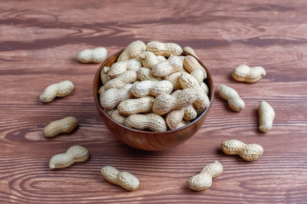 Raw organic peanuts in shell.