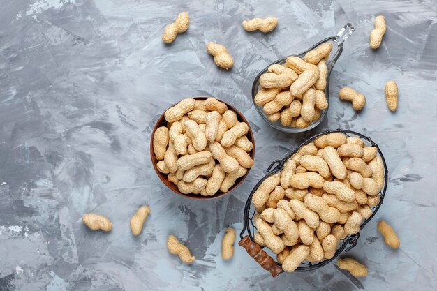 Raw organic peanuts in shell.