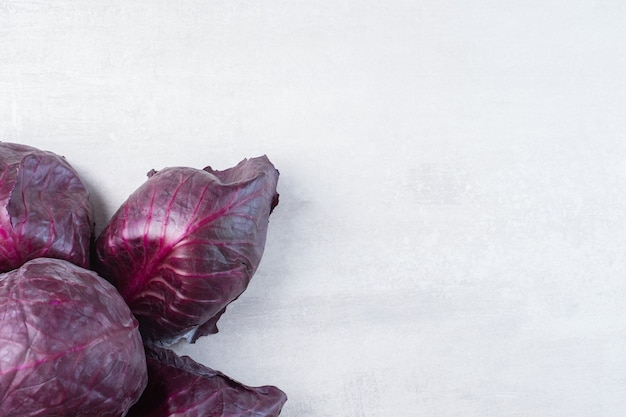 Raw purple cabbage on stone surface. High quality photo