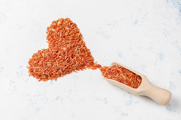 Raw red rice in a bowl