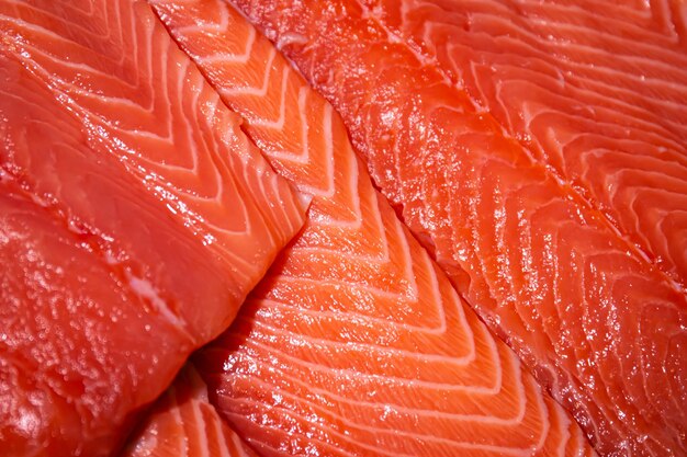 Raw salmon trout closeup on the showcase of a seafood store