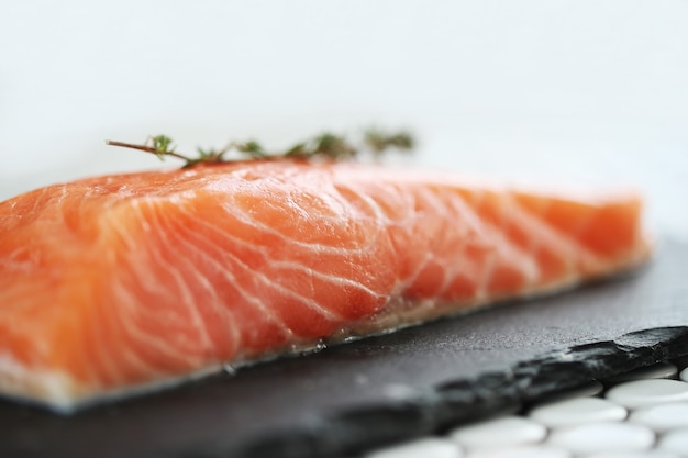 Raw salmon with pink salt and rosemary