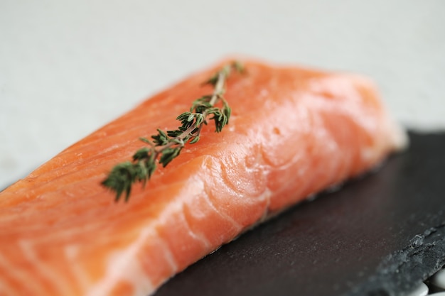 Raw salmon with pink salt and rosemary