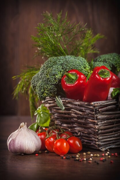 Raw vegetables in wicker basket