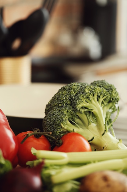 Raw vegetables on wooden board