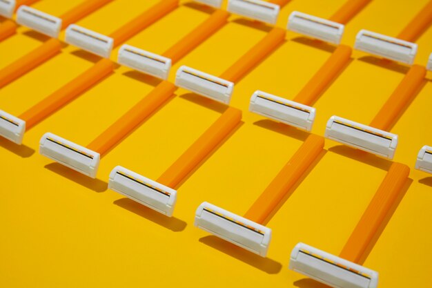Razor blades with yellow background