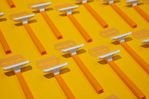 Razor blades with yellow background