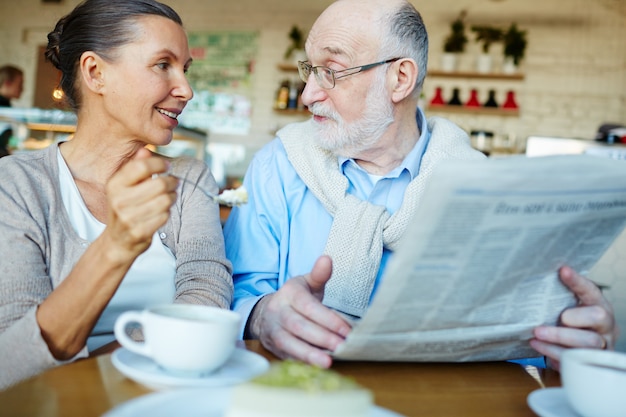 Reading newspaper