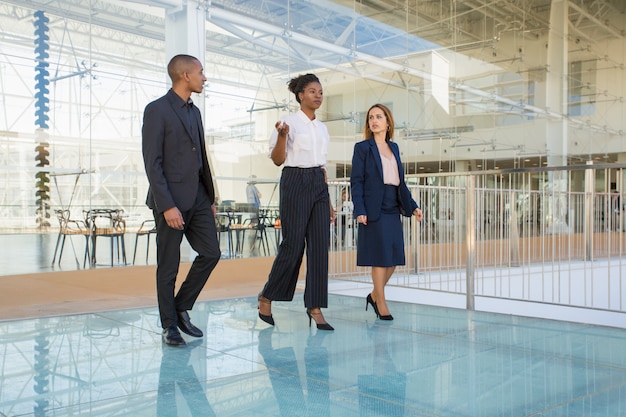 Real estate agent showing office building interior