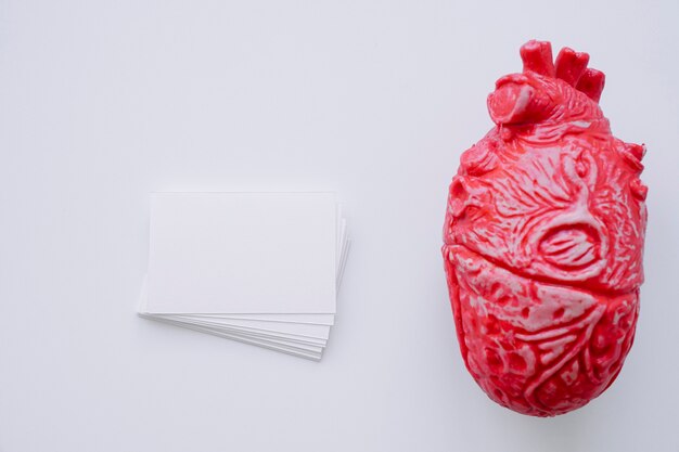 Realistic heart with business cards