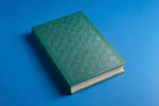 Realistic old book on blue background