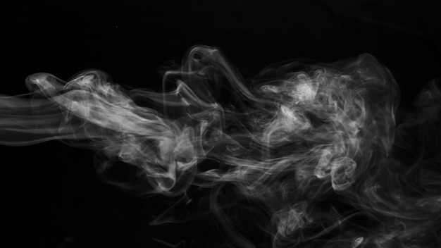 Free photo realistic steam smoke on black background