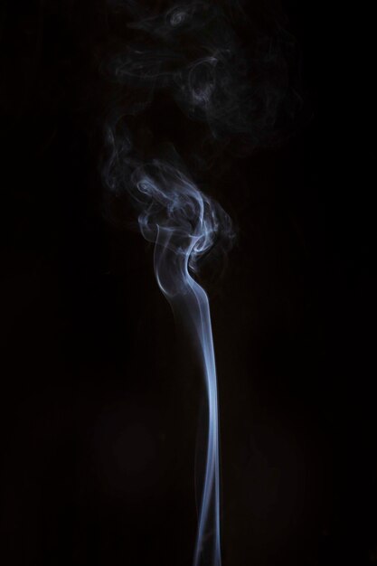 Realistic steam smoke on black background