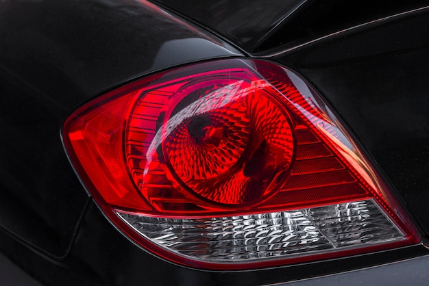 Rear light on new dark automobile 