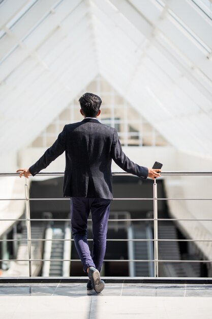 Rear view of businessman in an modern office