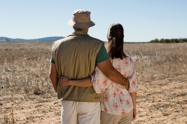 Rear view of couple on landscape