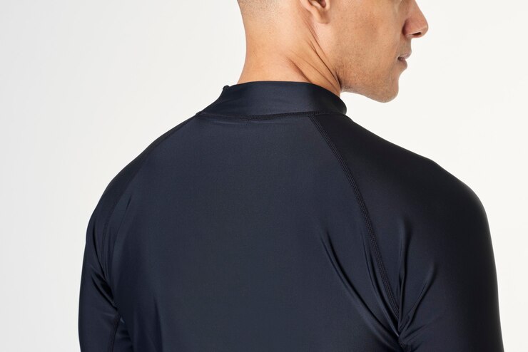 Free Photo rear view of a man in a long sleeved swimming top