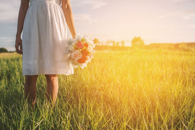 Rear view of teenager holding her bouquet