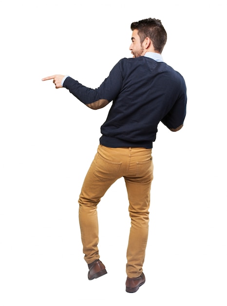 Free photo rear view of young man dancing