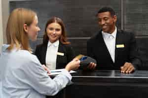 Free photo receptionists in elegant suits during work hours