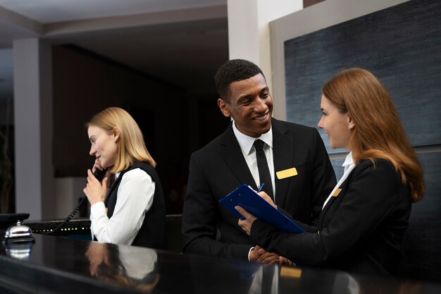 Receptionists in elegant suits during work hours