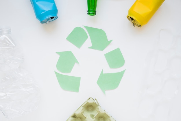 Recycle logo with rubbish 