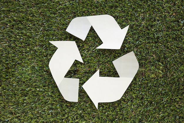 Free photo recycle symbol on grass