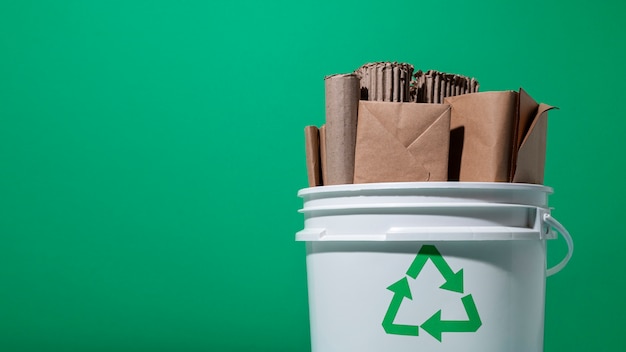 Recycling container with cardboard items