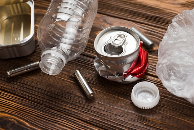 Recycling garbage placed on wooden desk