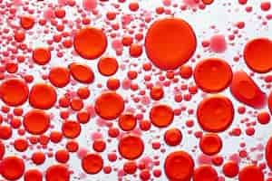 Free photo red abstract background oil bubble in water wallpaper