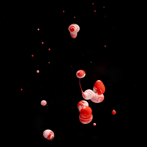 Red acrylic balls in water