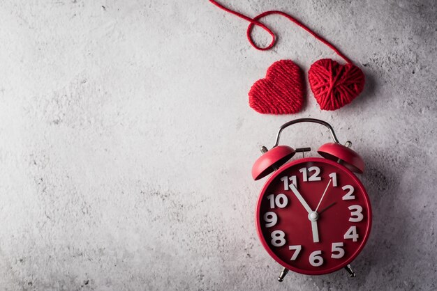 Red alarm clock with Red heart, Valentines day concept.